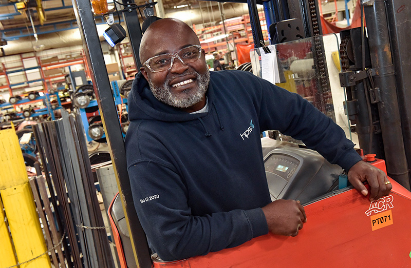 smiling forklift driver
